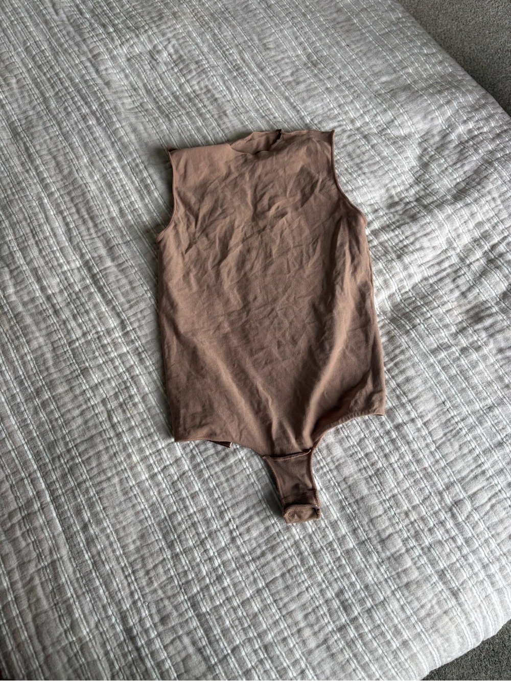 SKIMS Sleeveless Mock Neck Bodysuit in Cocoa